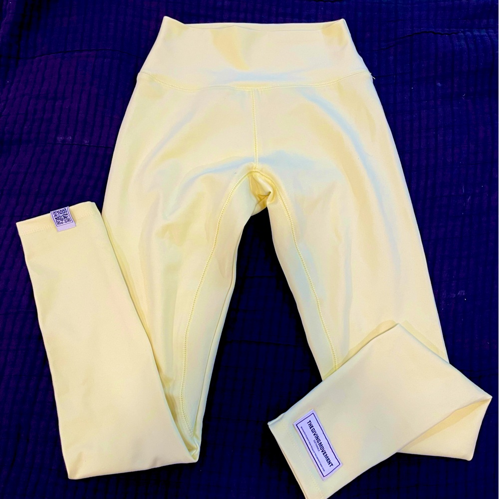 The Giving Movement Leggings - EXCELLENT CONDITION